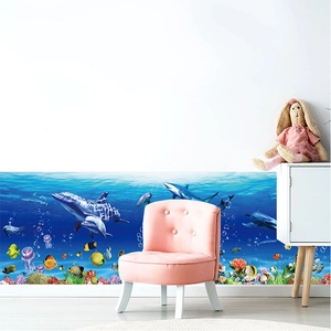 Underwater world wall decal featuring dolphins and coral reefs for nursery room decor