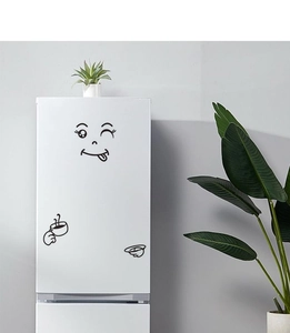 Funny smiling face fridge sticker with coffee cup detail on a white refrigerator