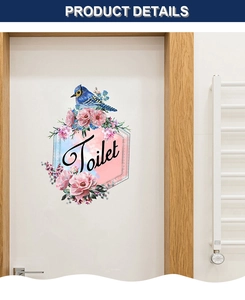 Détail du sticker mural fleuri avec oiseau bleu et texte Toilet sur une porte blanche