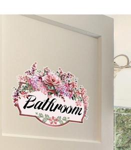 Detailed view of floral bathroom door sticker with elegant rose patterns and text
