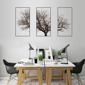 Modern Nordic triptych wall art featuring gray dry tree branches with sleek black frames