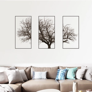 Nordic grey three-piece wall art featuring minimalist winter tree shadows in black frames