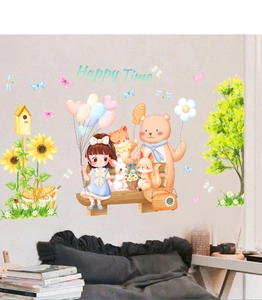 Close-up of cartoon girl and bear wall stickers with Happy Time text in child room