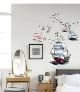 Detail of nautical wall stickers featuring sailboats and birds for home decor