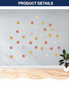 Detailed view of colorful daisy flower wall stickers on a minimalist grey tile background