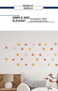 Detail of colorful daisy wall stickers in a cozy Nordic living room setting