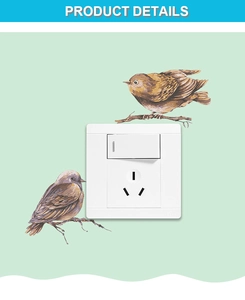 Detail of cute brown birds wall decals applied around a white home light switch