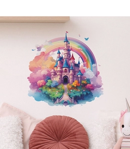 Detail of whimsical castle and rainbow wall decals on a cozy nursery room wall