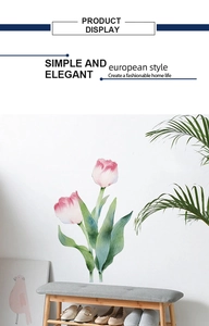 Detailed view of watercolor tulip wall decals in a modern pink and green nordic style
