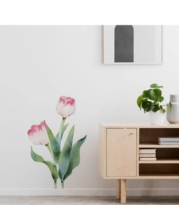Detail of pink watercolor tulip wall sticker applied to white wall in a minimalist room