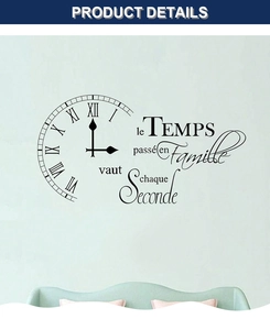 Close-up of black vinyl wall sticker with Roman numerals and French family quote