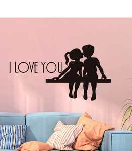 Detail of I LOVE YOU wall sticker featuring a romantic silhouette of a kissing couple