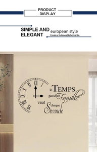 Detail of French wall sticker with Roman numeral clock and family quote for home decor