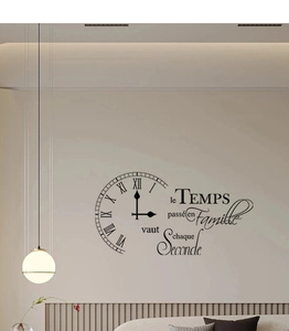 Detail of wall decal showing a French family quote with a Roman numeral clock design