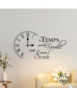 Detail of French wall decal featuring a Roman numeral clock and family time quote
