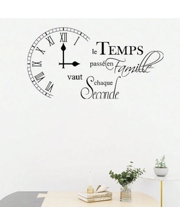 Detail of wall decal showing a black Roman numeral clock and French family quote stickers