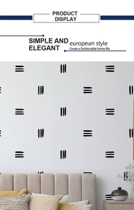 Détail de stickers muraux minimalistes en PVC avec rayures géométriques noires pour chambre