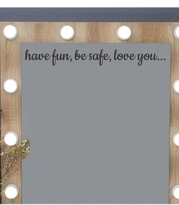 Detail of artistic black vinyl wall stickers with caring quotes on a smooth surface