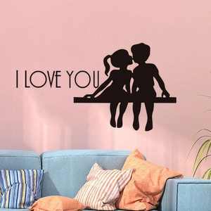 Romantic I LOVE YOU wall sticker silhouette of kids kissing above a sofa for home decor