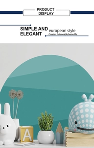 Detail view of semi-circle wall decal with blue gradient in a minimalist kids' room