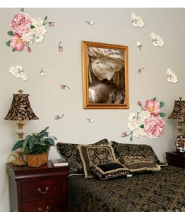 Detailed view of vintage pink peony wall decals in a retro European style bedroom setting