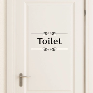 Sticker mural élégant noir mat pour toilettes avec motifs de volutes pour portes