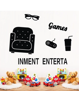 Detail view of black silhouette wall decals featuring a sofa, game controller, and drinks