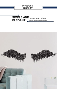 Minimalist black sketch wing wall stickers displayed in a modern white bedroom setting