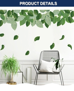 Detailed close-up showing green leaf wall stickers in a modern minimalist home interior