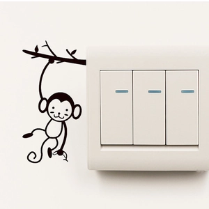 Sticker mural singe sur branche pour décoration d'interrupteur en vinyle noir