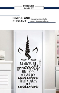 Minimalist unicorn wall sticker with humorous quote on a white door for room decor