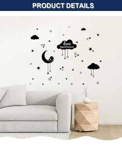 Detail view of black moon, stars and cloud wall stickers with Love Beyond Measure text