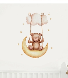 Close-up of watercolor bear on moon swing wall decal with clouds and yellow stars