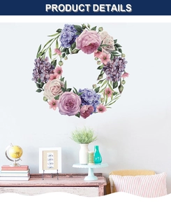 Detail view of a hand-painted floral wreath wall sticker on a white home living room wall