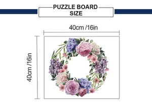 Detail view of the 40cm square puzzle board size with hand-painted floral wreath design