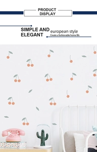 Bedroom wall scene with cute coral pink cherry and green leaf stickers for home decor