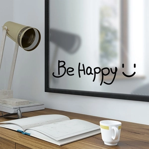 Minimalist 'Be Happy' wall sticker with smiley face on mirror in cozy room setting