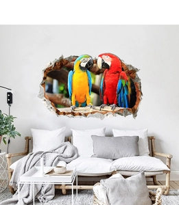 Detailed 3D wall decal showing two macaws emerging from a cracked wall in a living room