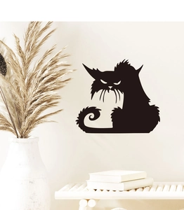 Detail of black cat silhouette wall sticker on white wall for Halloween home decor