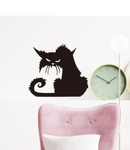 Detail of artistic black cat wall sticker with matte finish in a modern living room