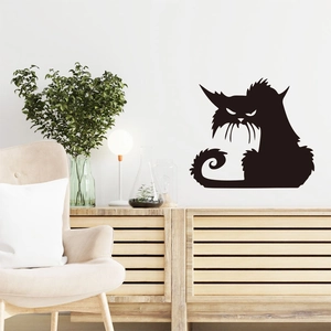 Black cat silhouette wall sticker for Halloween decor in a modern living room setting