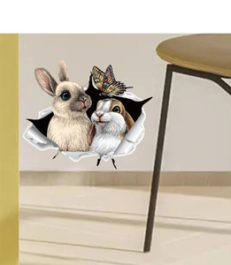 Detailed 3D wall decal of realistic rabbits breaking through a cracked wall effect
