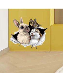 Close-up detail of 3D broken wall effect wall sticker with realistic bunnies and butterfly