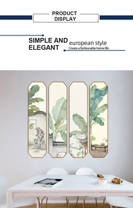 Detailed set of four banana leaf ink paintings with elegant gold frames in a dining area