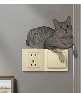 Realistic 3D grey tabby cat wall sticker placed above a white light switch