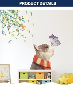 Detail of cat wall sticker with blue butterfly and floral vines in a cozy kids room