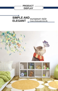 Detail showing a cartoon cat with scarf and butterflies wall decal in a cozy kids room