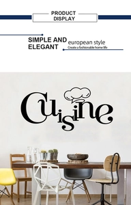 Dettaglio dell'adesivo murale Cuisine con icona cappello da chef su parete bianca