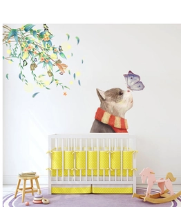 Detail of PVC wall sticker with cat, butterfly and green vine for nursery decor