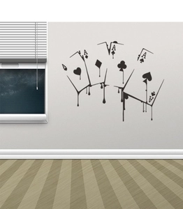 Detail of creative melting poker cards wall decal with a unique street art aesthetic design